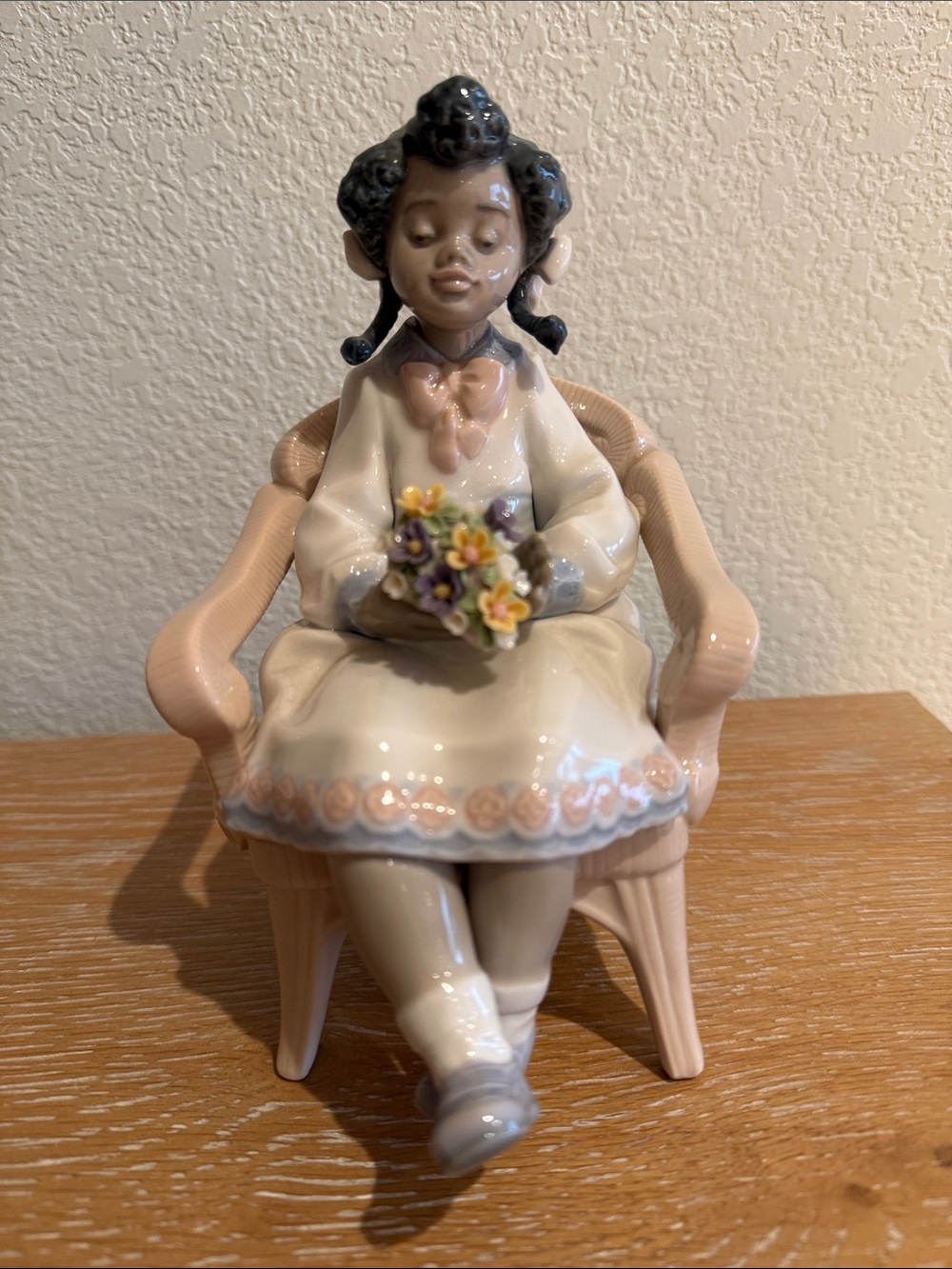 Lladro “Sitting Pretty” #5699. Black Legacy Collection. Porcelain.